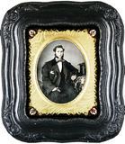 Thumbnail preview of Three-quarter portrait of a sitting young man…