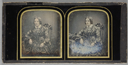 Prévisualisation de 3/4 length portrait of a seated woman with on… imagettes