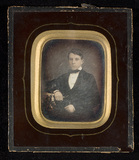 Thumbnail preview van Portrait of a young man, seated with his righ…