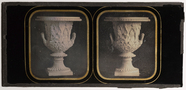 Thumbnail preview of Still life, depicting a marble urn on the tab…