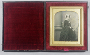 Thumbnail af Portrait of a standing woman before a painted…