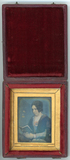 Thumbnail preview of Three quarter portrait of a woman wearing a p…