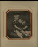 Thumbnail af Portrait of two children in a similar dress