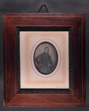 Thumbnail af Three  quarter length portrait of seated bear…