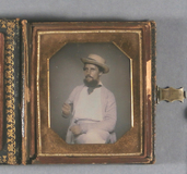 Thumbnail preview of Half length portrait of a man, looking at the…