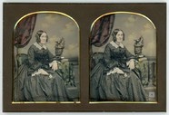 Thumbnail preview van Portrait of a woman seated on an upholstered …