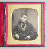 Prévisualisation de Half length portrait of a seated man,  with o… imagettes