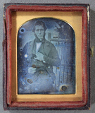 Prévisualisation de Portrait of a seated man facing forward, with… imagettes