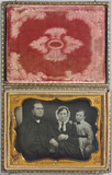 Miniaturansicht Vorschau von Half length portrait of a family of three: ma…