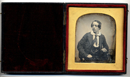 Thumbnail preview of A half length portrait of a young man sitting…