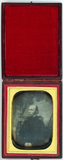 Miniaturansicht Vorschau von Half length portrait of a man.wearing a dark …