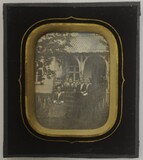 Thumbnail af Portrait of four women outside a house with a…