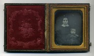 Thumbnail af Seated lady with blurred child