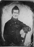 Stručný náhled portrait of a seated man with a small hairpie…