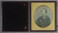 Prévisualisation de Half length portrait of a seated man with his… imagettes