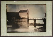 Stručný náhled View of a covered bridge entrance with walkwa…