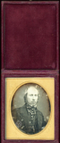 Miniaturansicht Vorschau von Head and shoulders portrait of a man. He has …