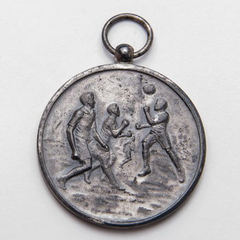Medaille van metaal, uitgereikt bij schoolwedstrijd Theole, 1937