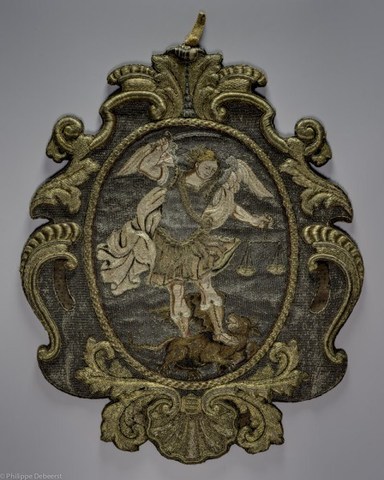 Wapenschild van het ambacht van de Gentse kruideniers, kaaskopers en kaarsgieters met voorstelling van de aartsengel Michael