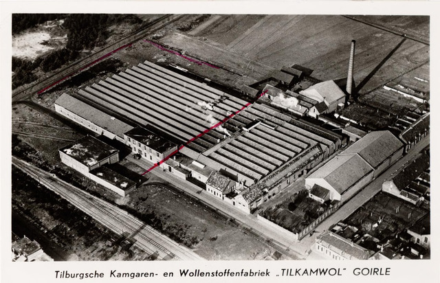 047579 - Textielnijverheid. Tilburgsche Kamgaren- en Wollenstoffenfabriek - Tilkamwol -Goirle. In 1937 werd de Tilkamwol in de gebouwen gevestigd van de voormalige Goirlese Jutespinnerij. Links op de foto is het goederenspoor naar Riel zichtbaar. Op 15 maart 1968 sloot de Tilkamwol haar poorten.